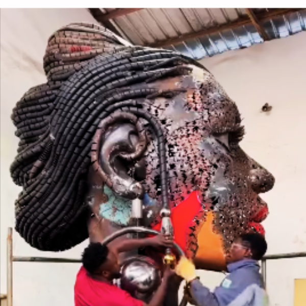 Dotun Popoola showcasing his recycled metal sculptures that celebrate Black beauty