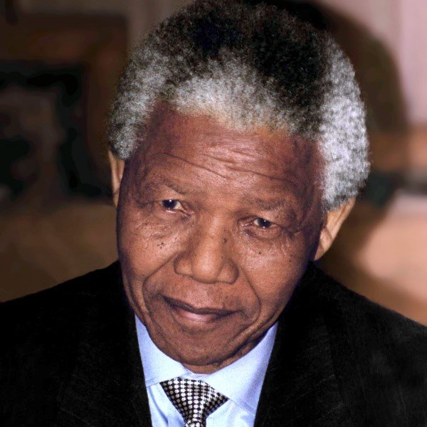 Nelson Mandela in black suit in 1994